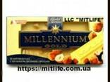 Шоколад Millennium с бесцельным лесным орехом молочный - photo 1